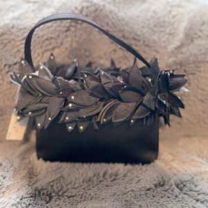 Angelique Accessories black satin leaf and crystal studded mini bag.